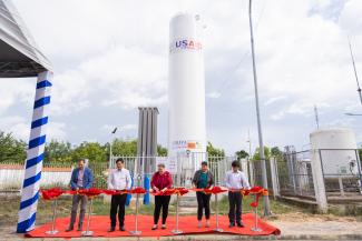 U.S. Consul General Marie Damour attends the launch of a new liquid oxygen system provided by the USAID.