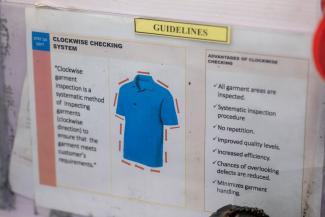Laminated page illustrating how to inspect garment