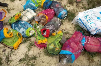 Ocean plastic debris sorted into mesh bags
