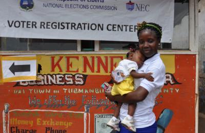 A woman and child at a voter registration center in Liberia