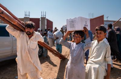 Link to 2022 at USAID Press Release (Photo: USAID delivers critical supplies to those recovering from severe flooding in Pakistan.)