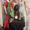 Fayza Salim Nany with some of her clothing products at the JO Fashion Expo in Amman, Jordan.