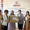 Cherry Gumapas, Health Development Office Director, USAID/Uzbekistan, in the center
