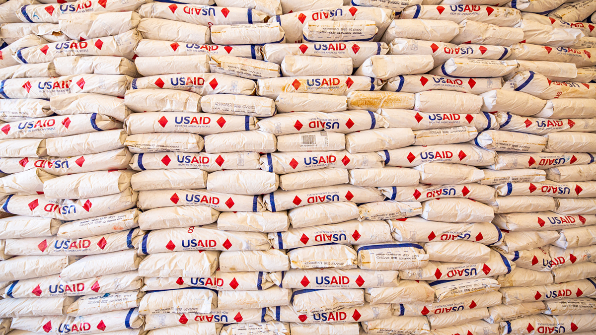 Stacks of USAID food bags.