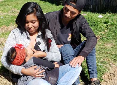 Mileidy and her partner Lino with their 7-month-old daughter. Photo: Gilda Rivera/HIP+ Guatemala