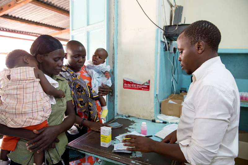 A health care worker consults with clients