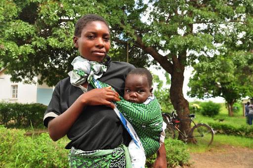 New mom Maria Mandira is just one of the women who benefitted from Saving Mothers, Giving Life’s efforts in Zambia. Photo credit: Amy Fowler/USAID